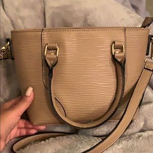 Tan crossbody bag.